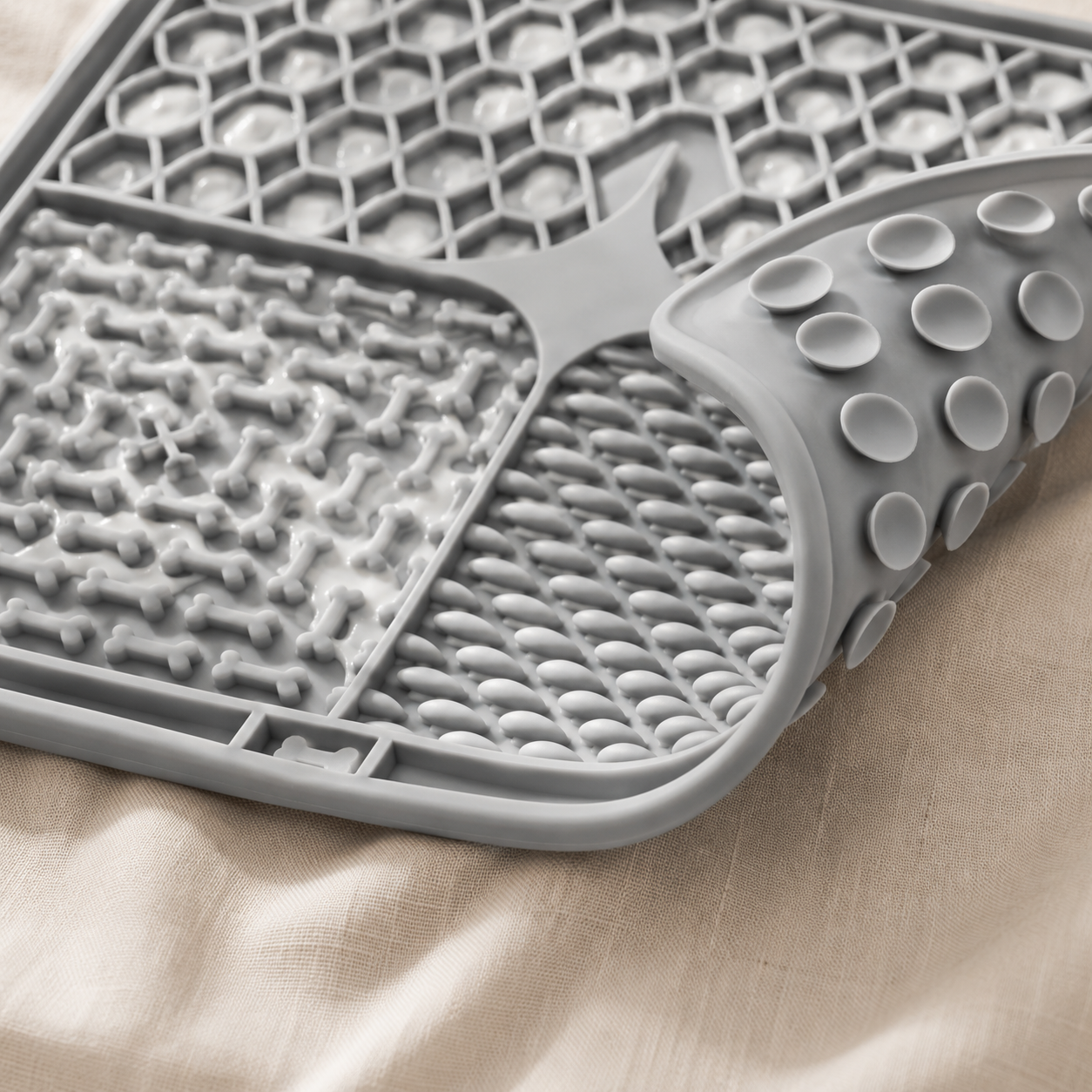 Underside of the Calm Lick Mat showing its strong suction-cup base